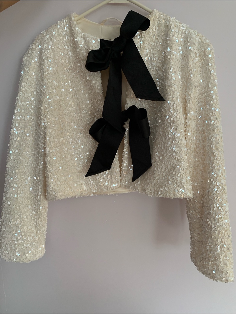 H&M Ivory Sequin Cropped Jacket with Black Bow Accents